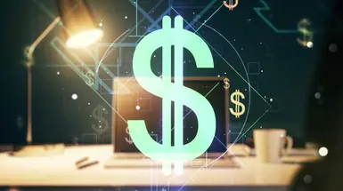 Table with a large neon $ sign on it