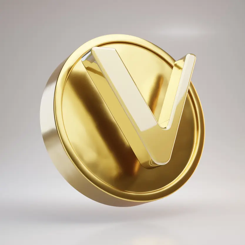 A single VeChain coin displaying a V logo in gold